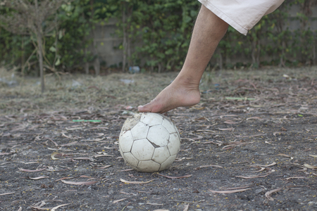 kids are playing soccer football for exercise in the evening.の写真素材