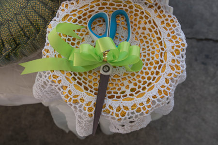 Scissors open job with concept for new business venture or opening ceremony