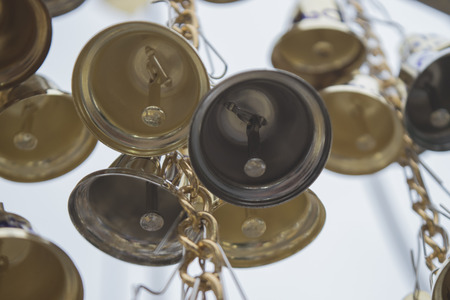 Small bells is gold and silver  isolated white backgroundの写真素材