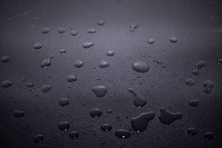 Droplets of water shot close up on various surfacesの写真素材