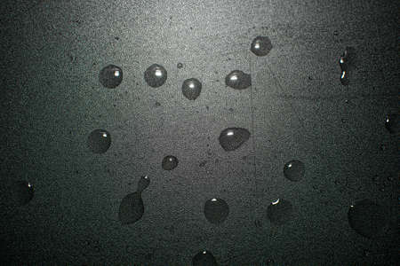 Droplets of water shot close up on various surfacesの写真素材