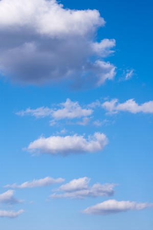 nice blue sky with fluffy cloudsの写真素材