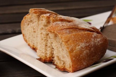 Sliced fresh rye sourdough bread served on plate