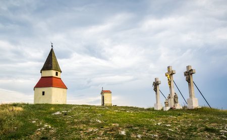Small Church, Chapel and Three Crosses on the Hill at Sunsetの写真素材