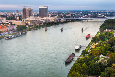 Danube River with Anchored Boats and Unmounted Old Bridge in Bratislava, Slovakia as Seen from Observation Deckの写真素材