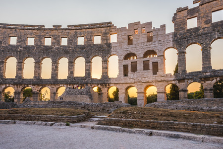 Inside of Ancient Roman Amphitheater in Pula, Croatia, Famous Travel Destination, in Sunny Summer Eveningの写真素材