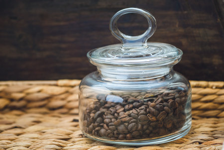 Roasted Coffee Beans in Closed Glass Jarの写真素材