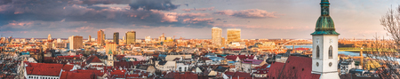 Cityscape of Bratislava, Slovakia with St. Martin's Cathedral and Danube River with New Bridge at Sunsetの写真素材