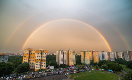 Double Rainbow at Sunset over Residential District Petrzalka, Bratislava, Slovakia.の写真素材