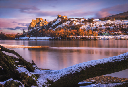 Snow Covered Devin Castle Ruins above the Danube River in Bratislava, Slovakia at Sunriseの写真素材