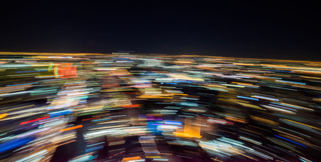 Abstract Background. Light Trails Caused by Skyscraper Rooftop Rotating Platform