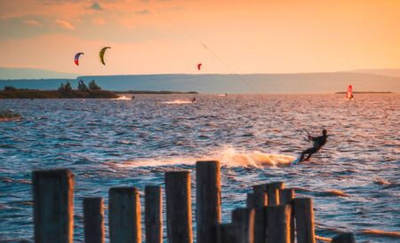 Kite Surfer at Neusiedl Lake in Podersdorf, Austria at Sunsetの写真素材