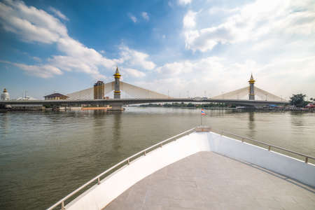 Maha Chesadabodindranusorn Bridge on Chao Phraya River in Bangkok, Thailand as Seen from the Boat.の写真素材