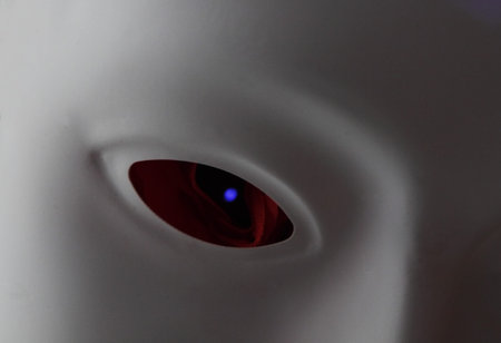 Alien eye staring through white mask
