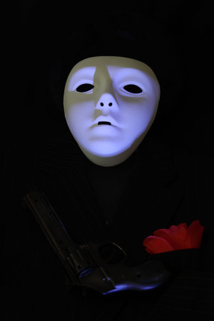 Mask of a ghoul with gun