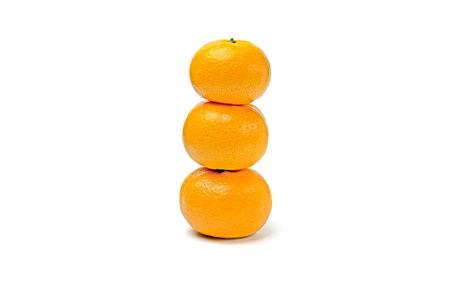 Three oranges are isolated on white background.の写真素材