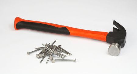 hammer and nails on a white backgroundの写真素材