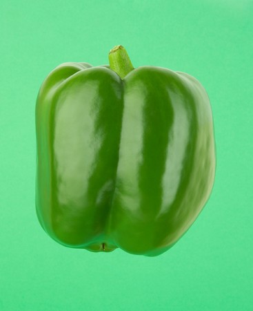 Green sweet pepper on green background xxlの写真素材