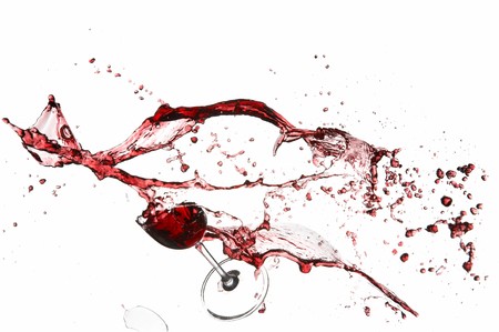 Explosion of a glass with red wine 
の写真素材