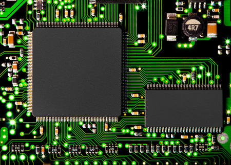  Close up of computer circuit board in green with transistors and chip. XXL