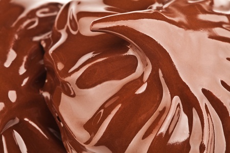 Melted chocolate with ripples and waves (zephyr) Backgroundの写真素材