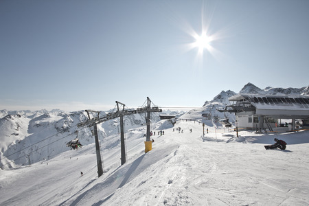 Montafon. Wonderful weather for winter sports action in Austria. Great view over some mountain ranges and peaks in a awesome snow landscape. Snowboarder. Ski.のeditorial素材