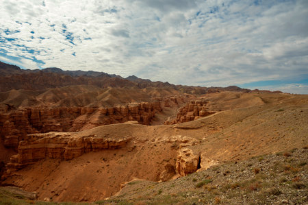 beautiful landscape, orange canyon mountains and cloudy skyの写真素材