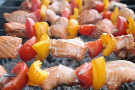 Shashlik with salmon, yellow pepper and tomatoの写真素材