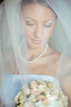 wedding  young bride posing in her wedding dayの写真素材