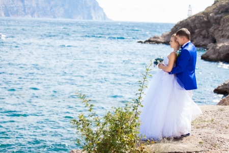 wedding: bride and groom on the seashoreの写真素材