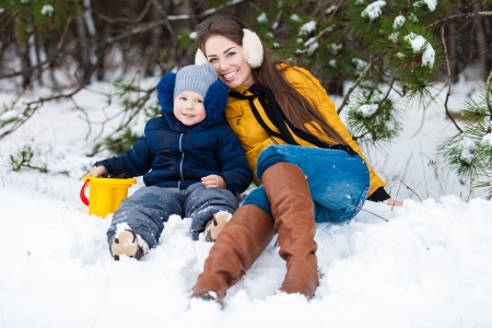 Mother and son enjoying beautiful winter dayの写真素材