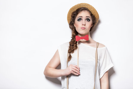 Portrait of funny Hipster Girl, studio shot