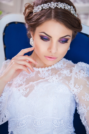 Beautiful bride in elegant expensive interiorの写真素材