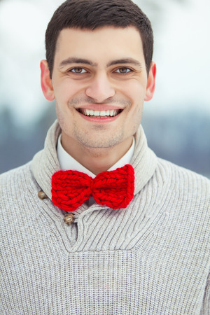 Groom in winter forestの写真素材