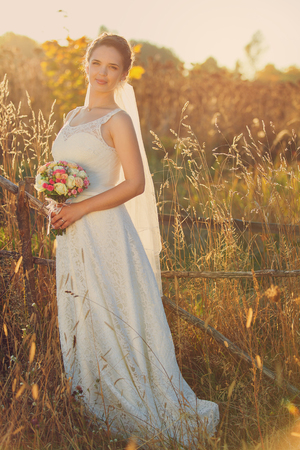 beautiful young bride in a wedding dressの写真素材