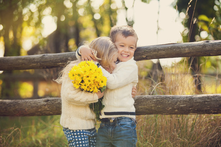 Adorable happy kids outdoors on sunny dayの写真素材