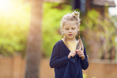 Happy kid girl having fun in the parkの写真素材