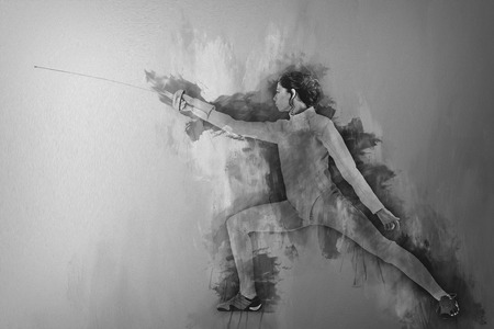 Portrait of woman wearing fencing costume practicing with the sword on background drips. Abstract art of fencing.の写真素材