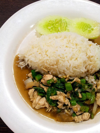 Spicy fried chicken with basil leavesの写真素材