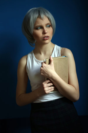 Girl with silver hair and book in her hands