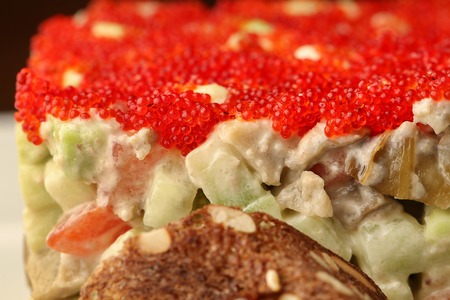 Olivier salad with red caviar. Close upの写真素材