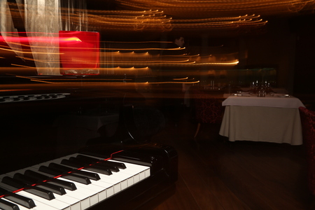 Piano on blurred backgroundの写真素材
