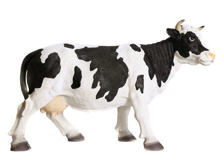 Black and white cow figurine. White backgroundのeditorial素材