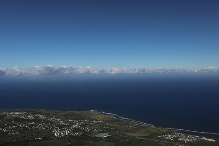 Top view of the sea and the village of which is between themの写真素材