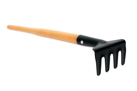 Small rake isolated on whiteの写真素材