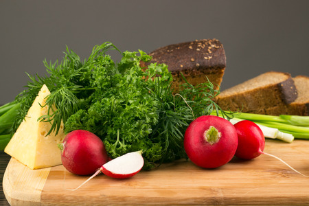 Healthy vegetarian food. Radishes, parsley, green onionsの写真素材