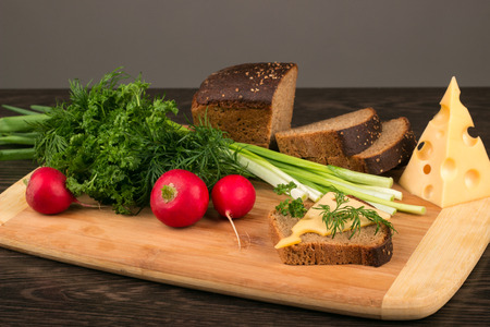 Healthy vegetarian food. Radishes, parsley, green onionsの写真素材