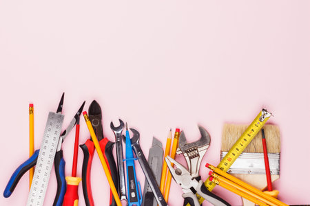 Set of construction tools on the light background