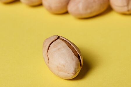 Healthy Food: Pecan on yellow Backgroundの写真素材
