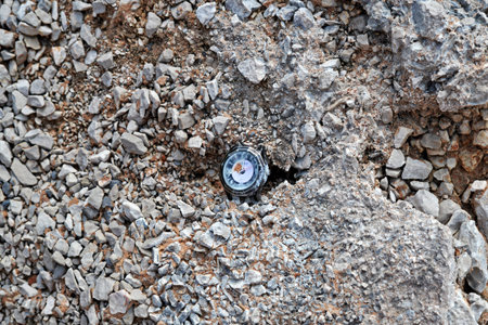 Broken watch attached to the rock